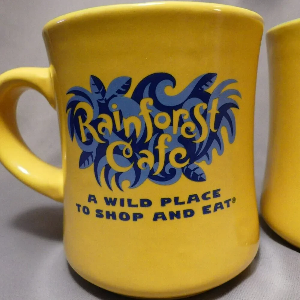 Rainforest Cafe A Wild Place to Shop and Eat Yellow and Blue 2 Coffee Mugs Heavy - Picture 3 of 12